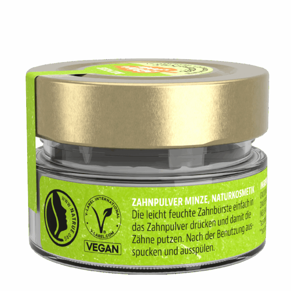 Zahnputzpulver mit Minze in einem Glasbehälter, vegan und als Naturkosmetik zertifiziert.